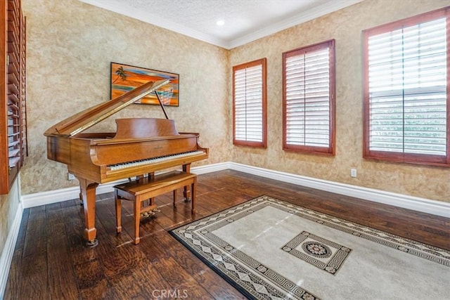 misc room with ornamental molding and hardwood / wood-style floors