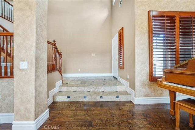 foyer entrance featuring hardwood / wood-style flooring