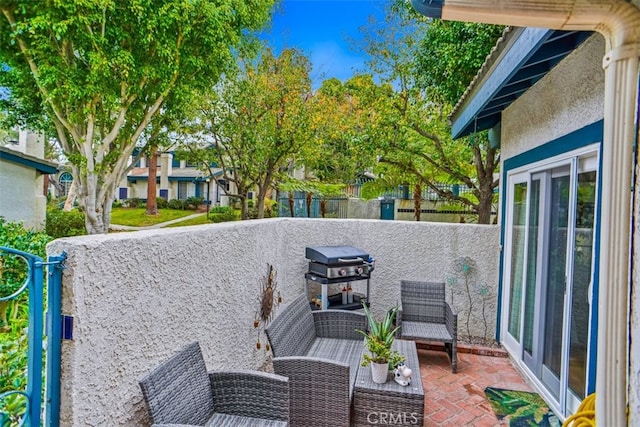 view of patio / terrace with an outdoor living space and grilling area