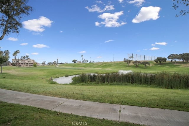 view of home's community featuring a lawn