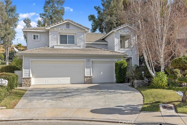 front of property featuring a garage