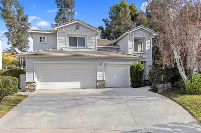 front of property with a garage