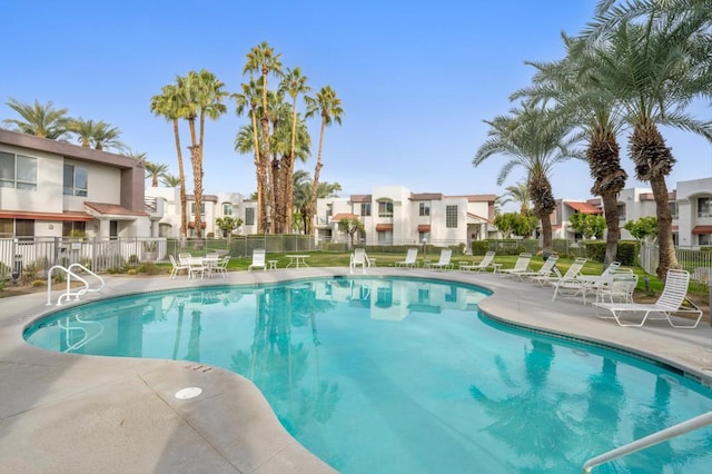 view of swimming pool with a patio area