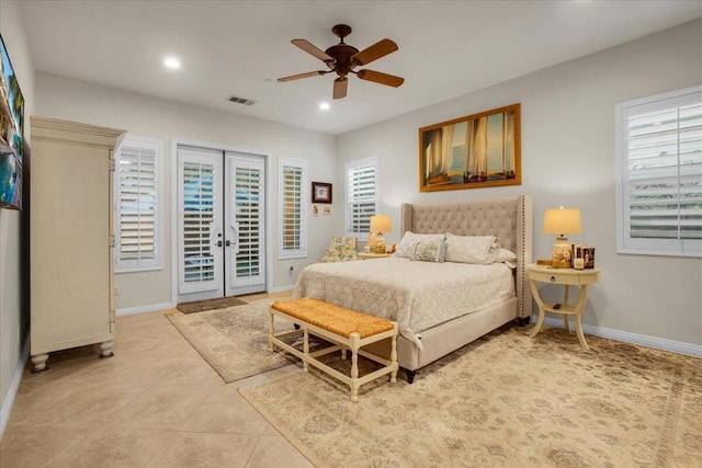 bedroom featuring ceiling fan, access to exterior, french doors, and multiple windows