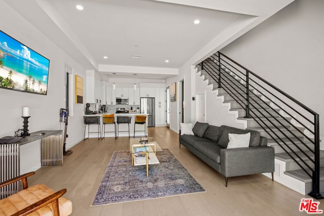 living room with light wood-type flooring