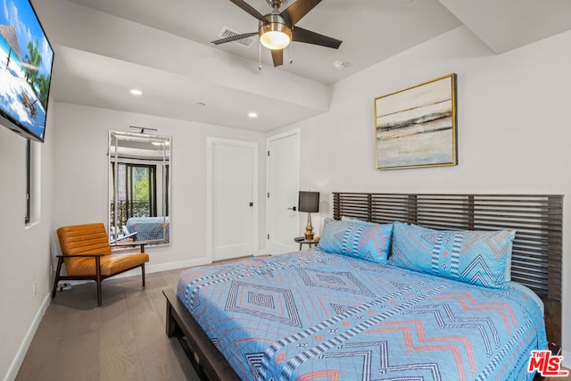 bedroom featuring ceiling fan and hardwood / wood-style floors