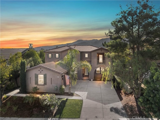 view of front of property with a mountain view