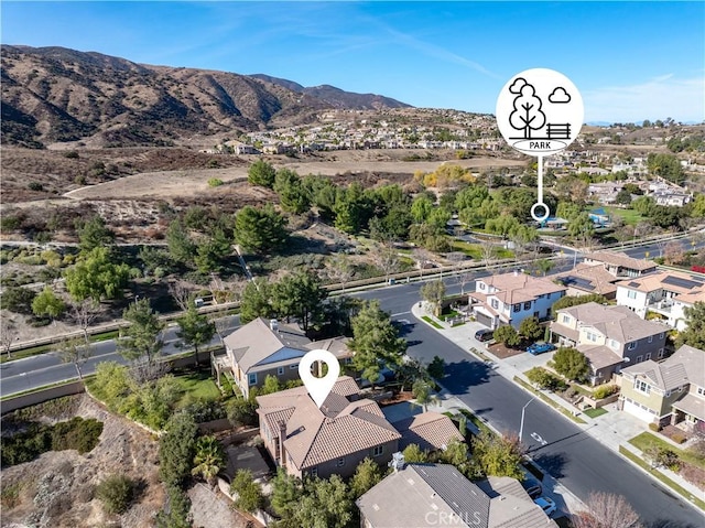 drone / aerial view featuring a mountain view