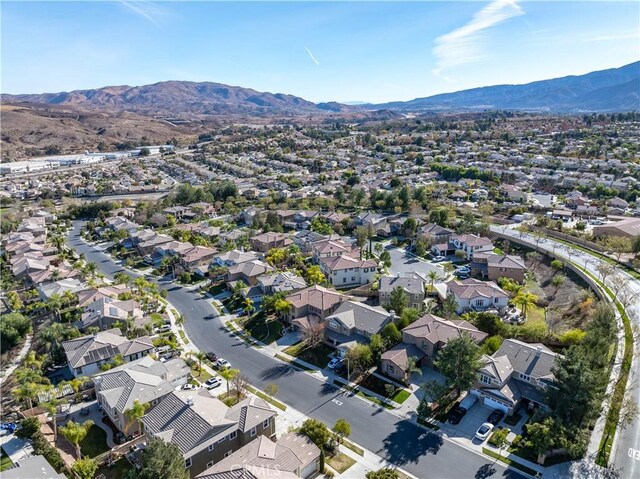 drone / aerial view featuring a mountain view