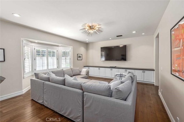 living room featuring dark wood-type flooring