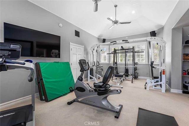 workout area with ceiling fan and carpet