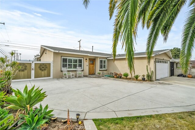 single story home with a garage