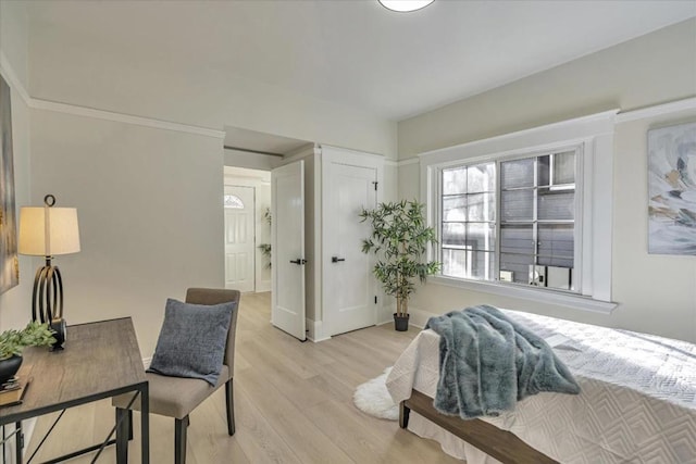 bedroom featuring light wood-type flooring