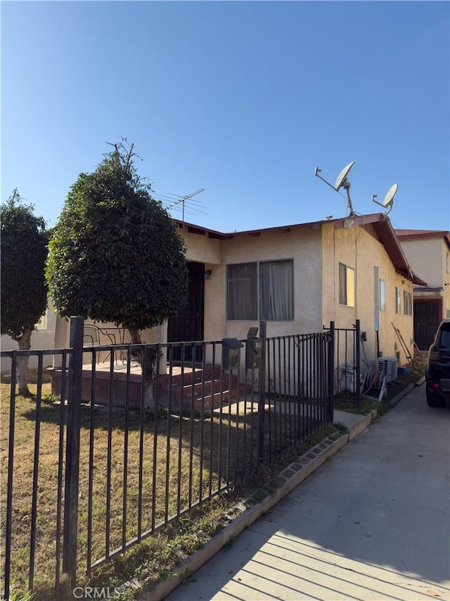 view of front of home with central AC