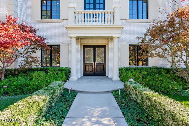 doorway to property with a balcony