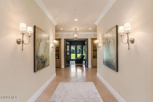 hallway featuring ornamental molding