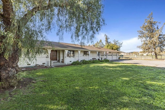 view of front of home with a front yard