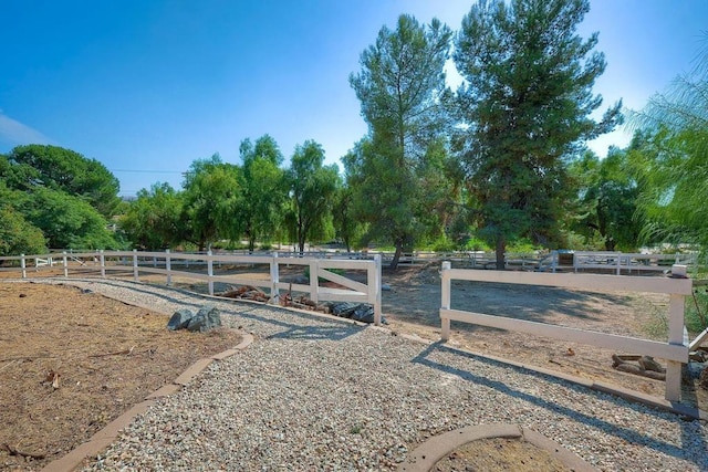 view of yard featuring a rural view