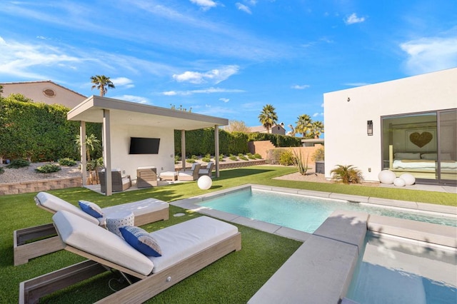 view of pool featuring a patio area, a lawn, and an outdoor living space with a fireplace