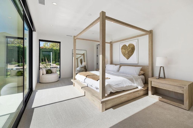 bedroom with floor to ceiling windows