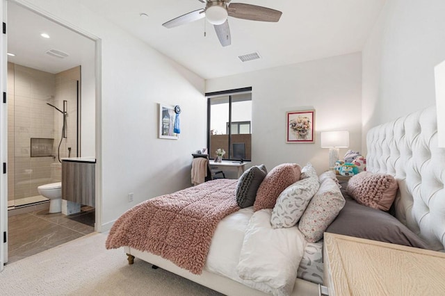 bedroom with ceiling fan and ensuite bathroom