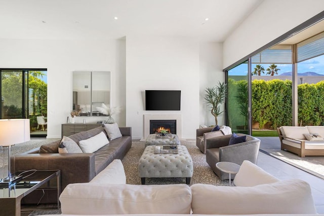 living room with a towering ceiling