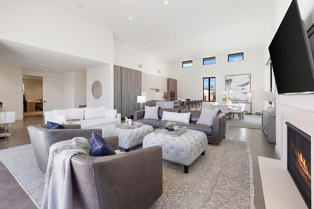 living room with a towering ceiling