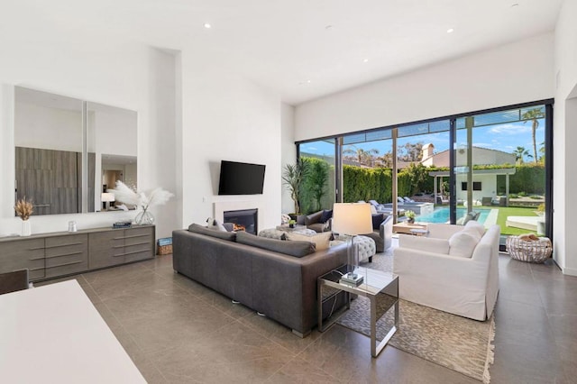 living room with a high ceiling