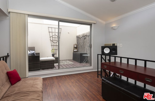 bedroom featuring dark hardwood / wood-style flooring, vaulted ceiling, and ornamental molding