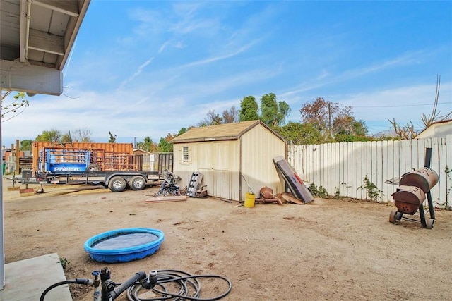 exterior space with a shed