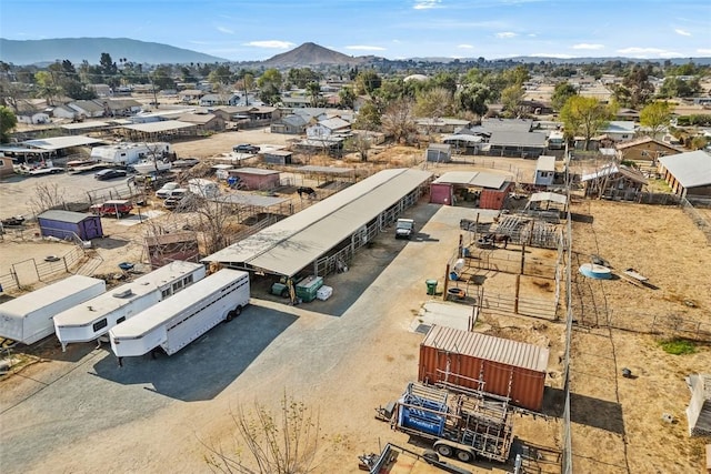 drone / aerial view featuring a mountain view