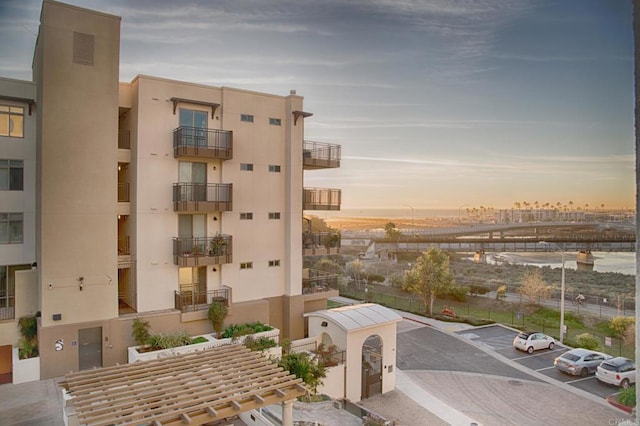 view of outdoor building at dusk