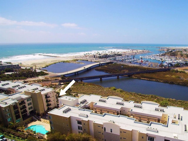 birds eye view of property featuring a water view