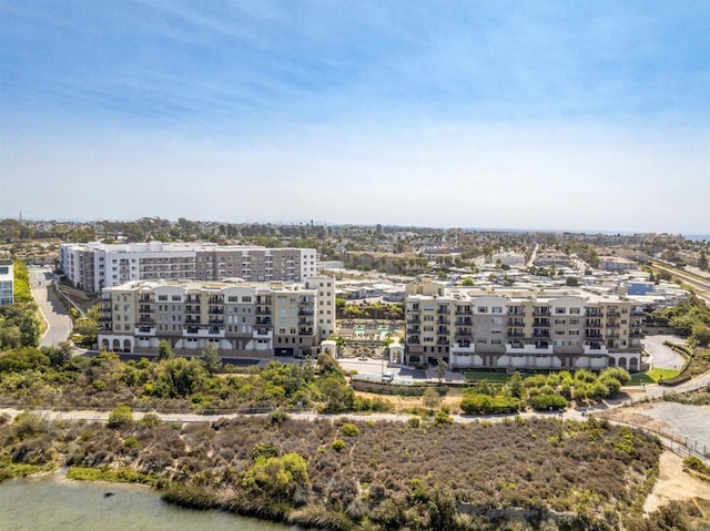 drone / aerial view with a water view