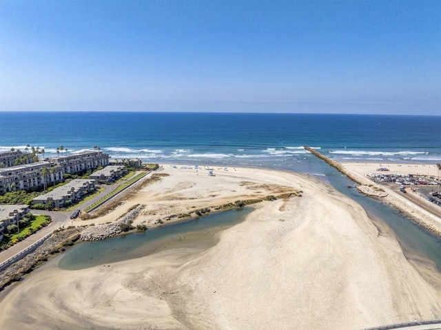 bird's eye view with a view of the beach and a water view