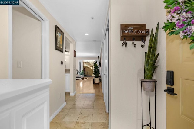 hallway with light tile patterned floors