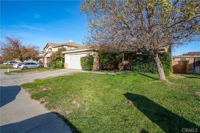 view of front of property with a front lawn and a garage