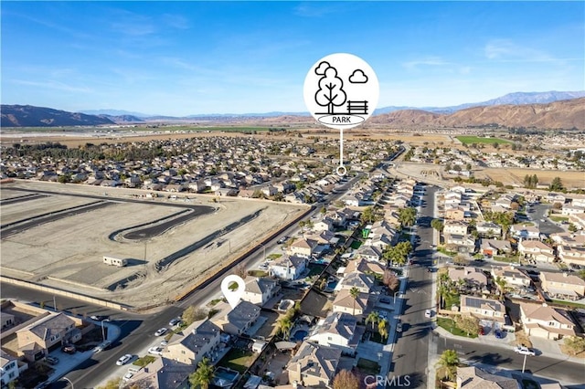 bird's eye view with a mountain view