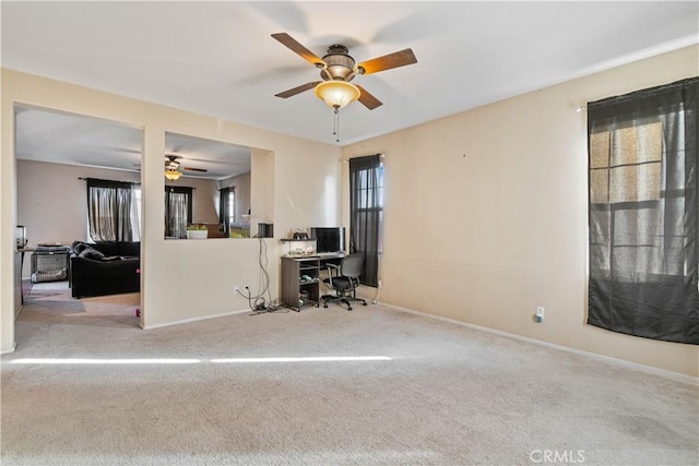 office area with light carpet and ceiling fan