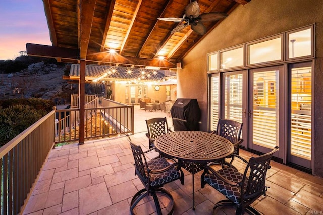 exterior space with ceiling fan and an outdoor hangout area