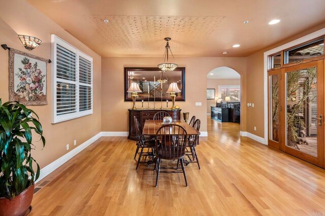 dining room with light wood-type flooring