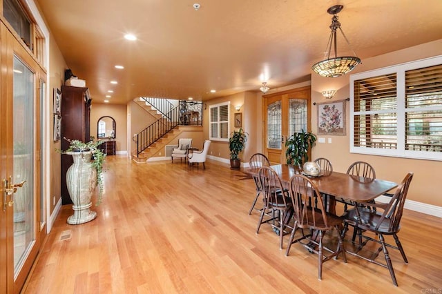 dining area featuring light wood-type flooring