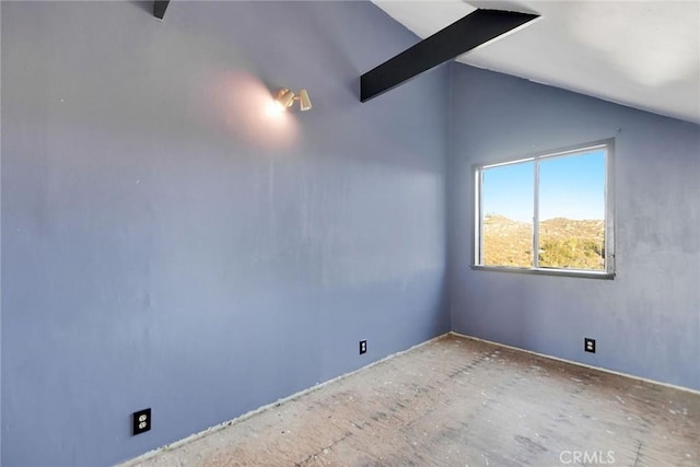 empty room with lofted ceiling