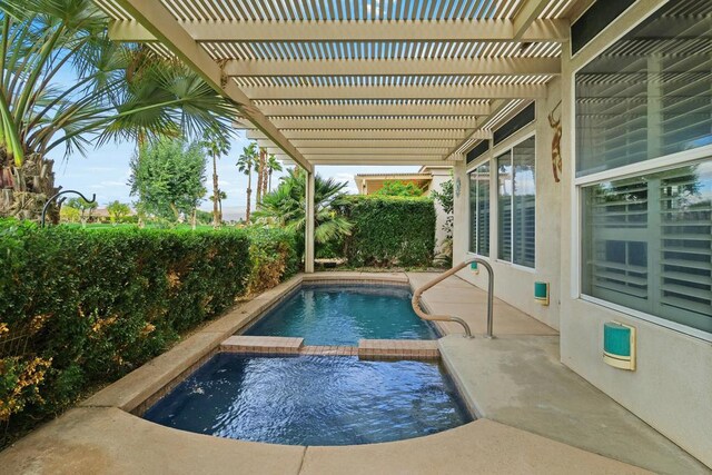 view of swimming pool with a pergola and an in ground hot tub