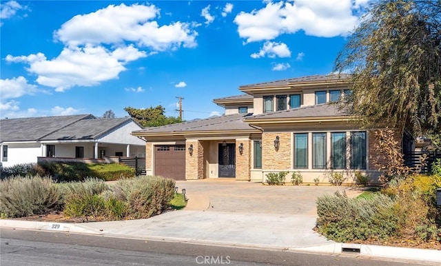 prairie-style house with a garage