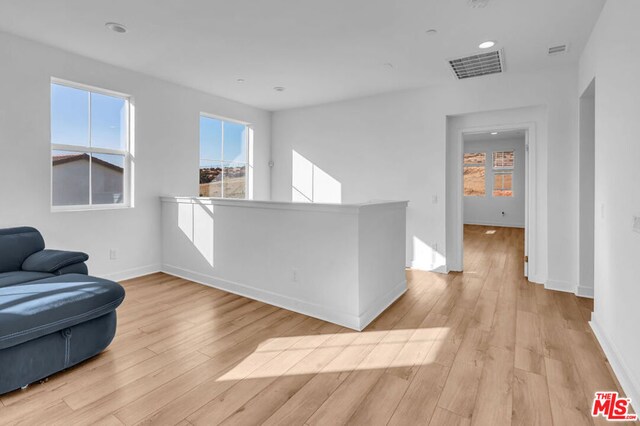 sitting room featuring light wood-type flooring