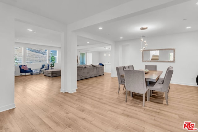 dining room with light hardwood / wood-style flooring