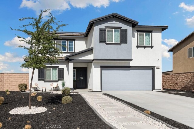 view of front property featuring a garage