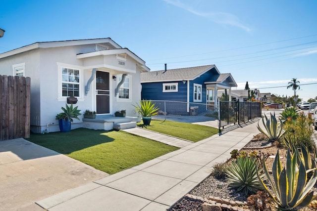 view of front of house with a front lawn