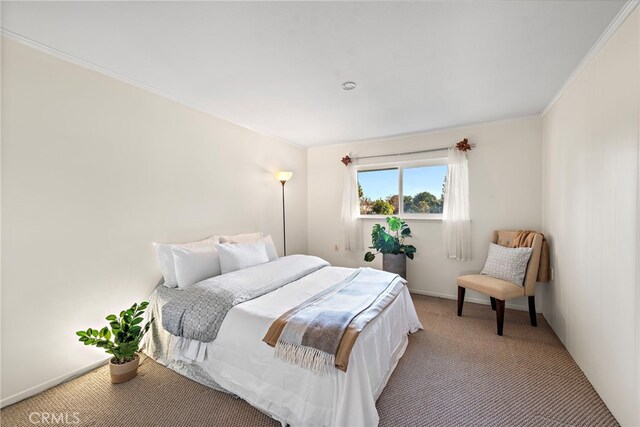 bedroom with light colored carpet